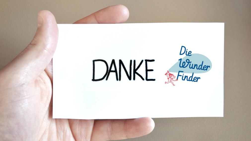 Notizzettel mit Aufschrift Danke und Wunderfinderlogo